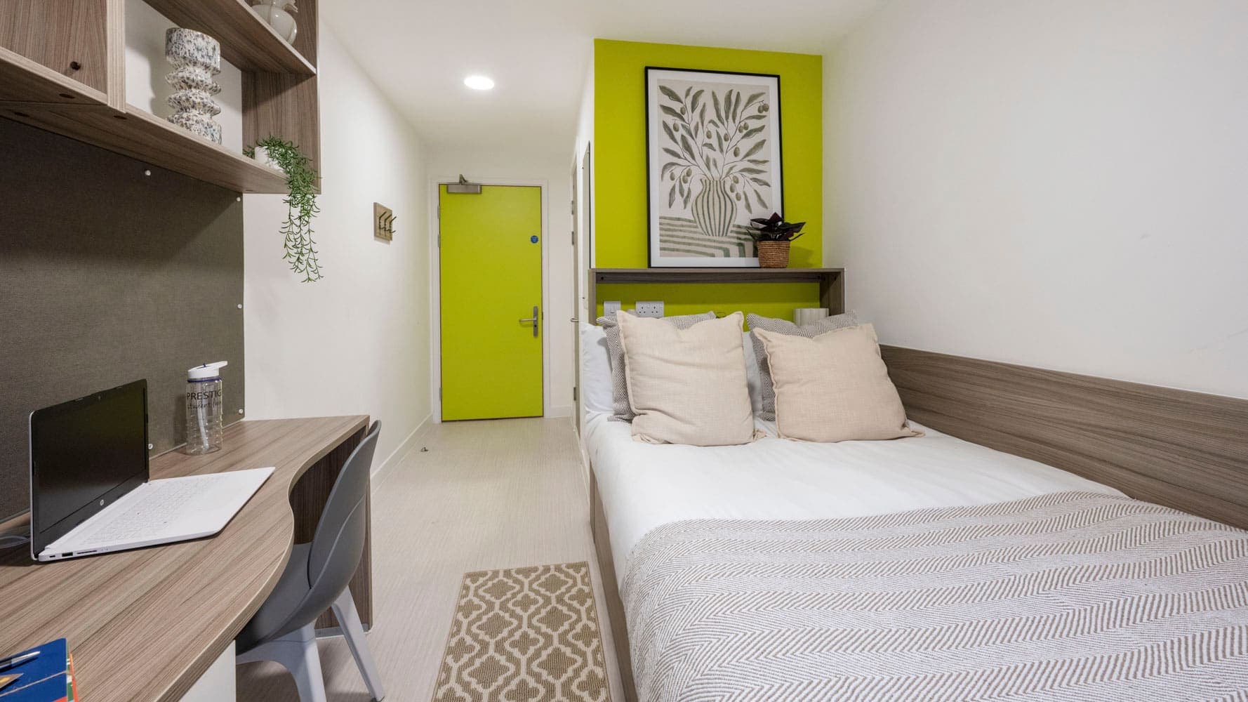 A Silver Plus Ensuite room at Foundry Courtyard, made up, with a study desk beside the window