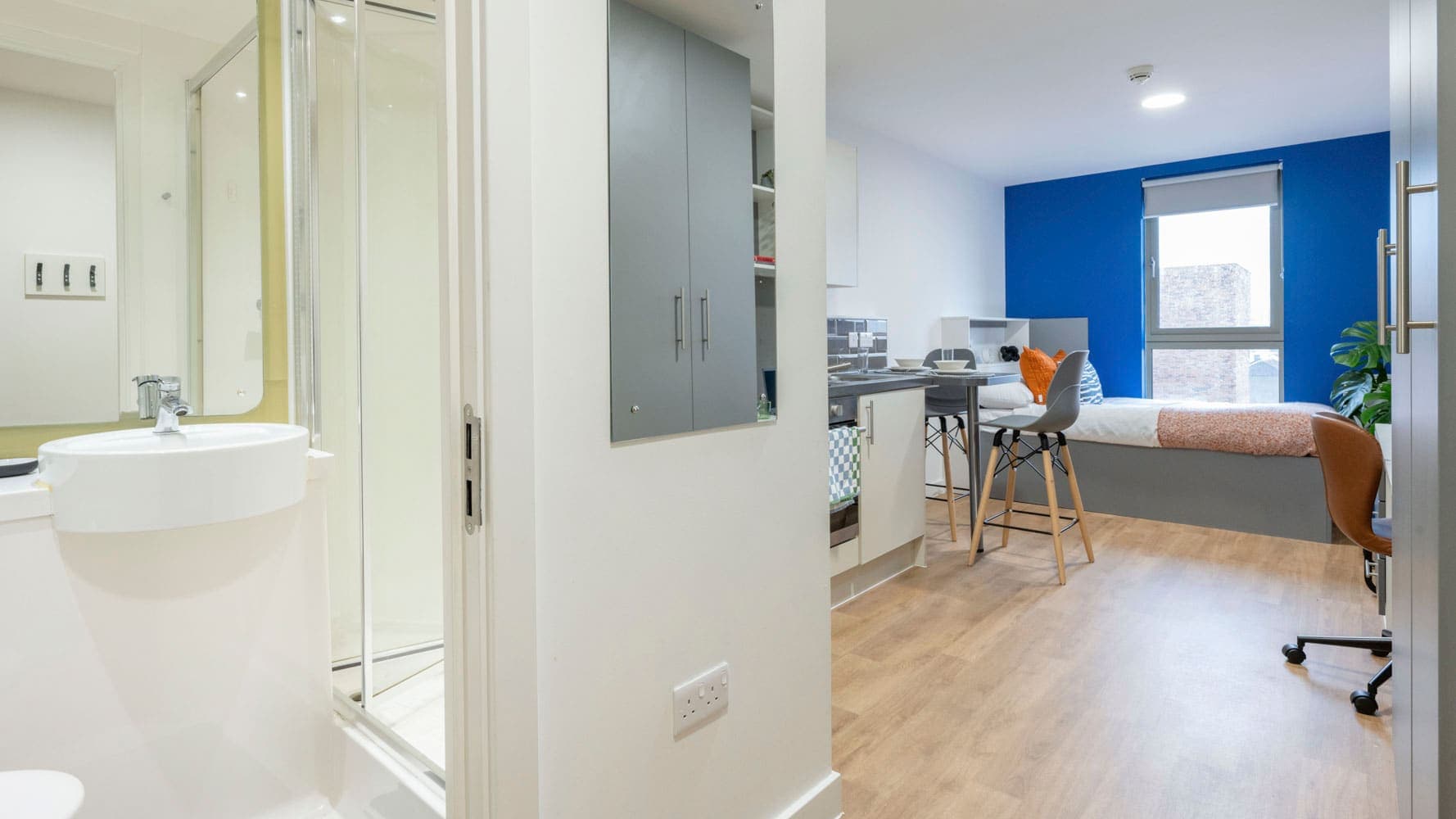 A Silver Studio Plus at Foundry Courtyard, with the bed, kitchenette and study area in one room